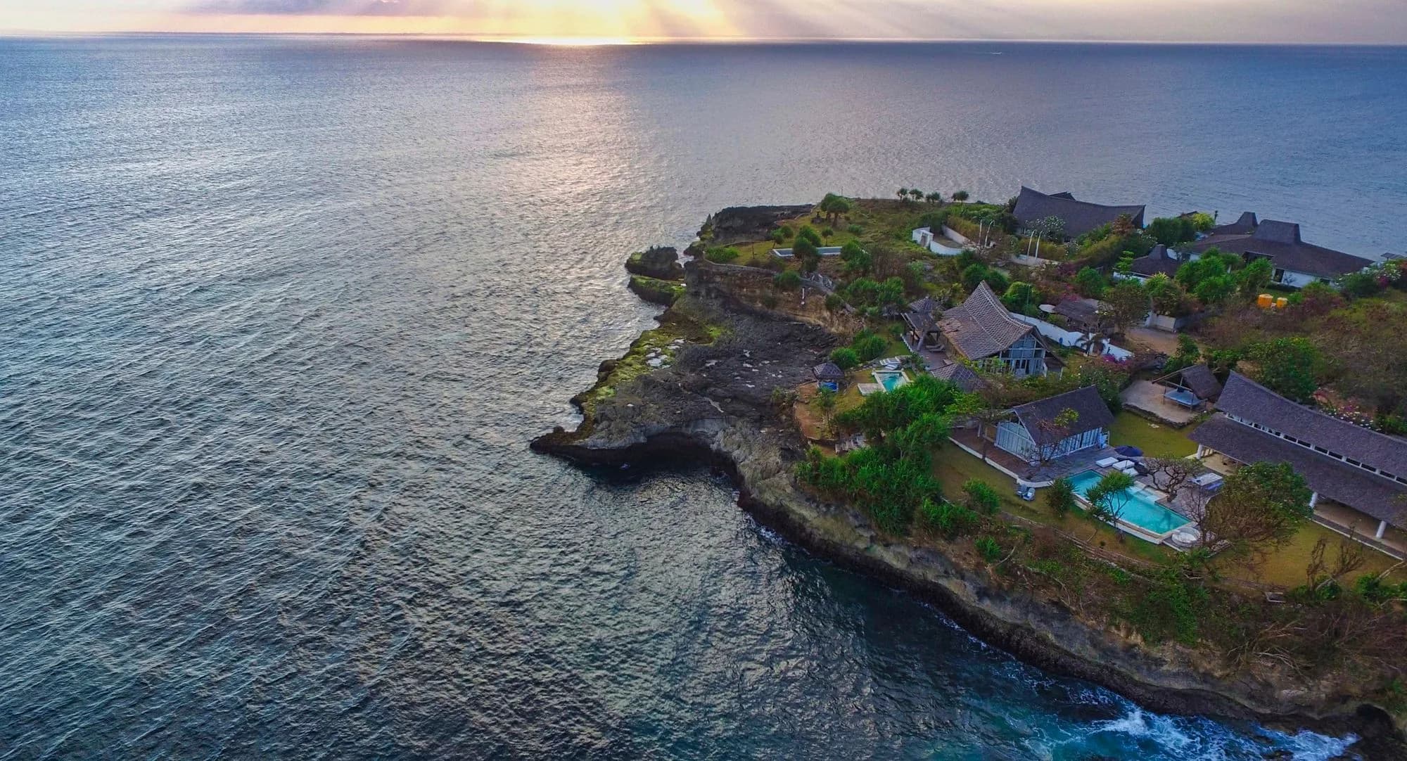 Villas with private pools on a clifftop above the sea at Nusa Penida, Bali