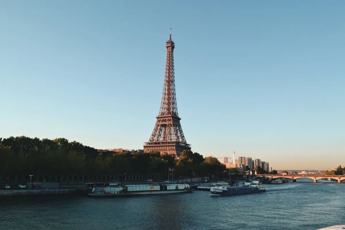The Eiffel Tower above the Seine in evening light