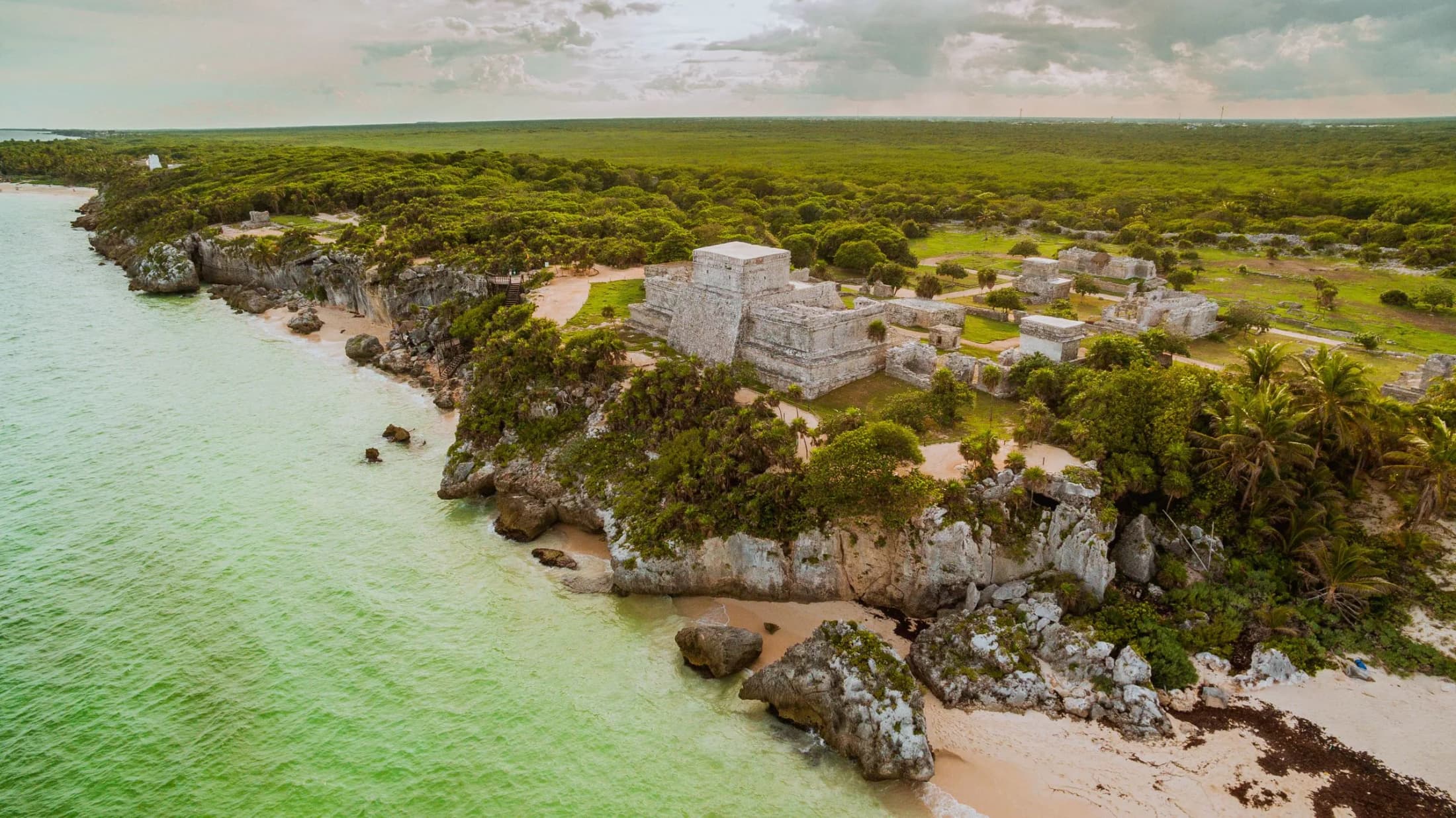 Aerial view of the Tulum ruins on a cliff above the Caribbean Sea